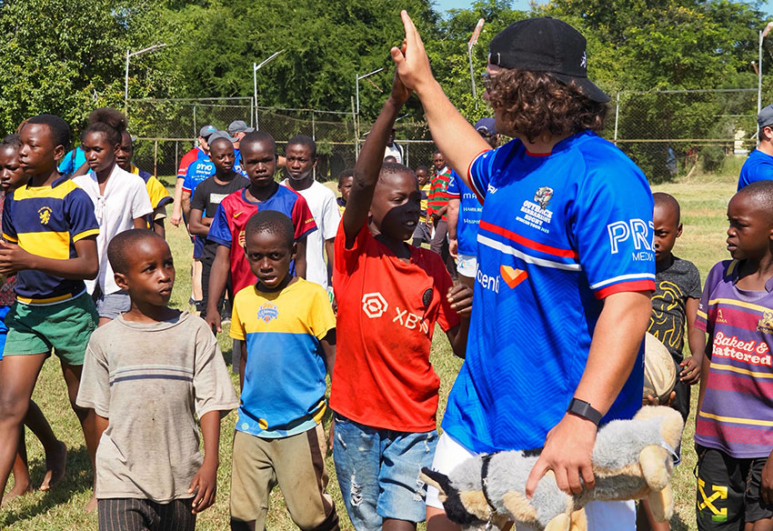 Jayden Robertson at kids training camp in Africa 2025 850x584