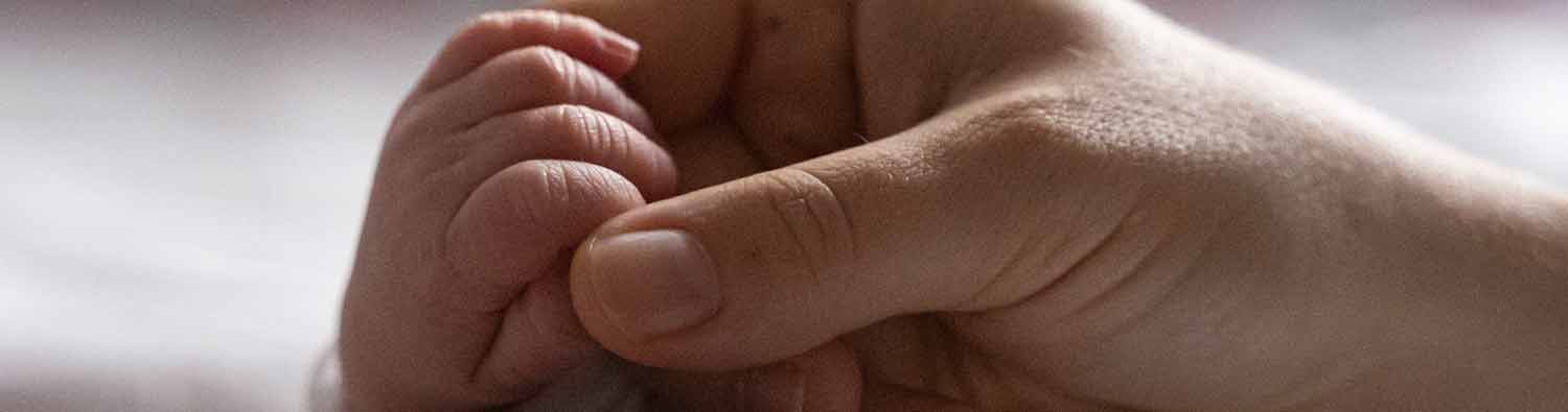 Baby hands banner iStock image